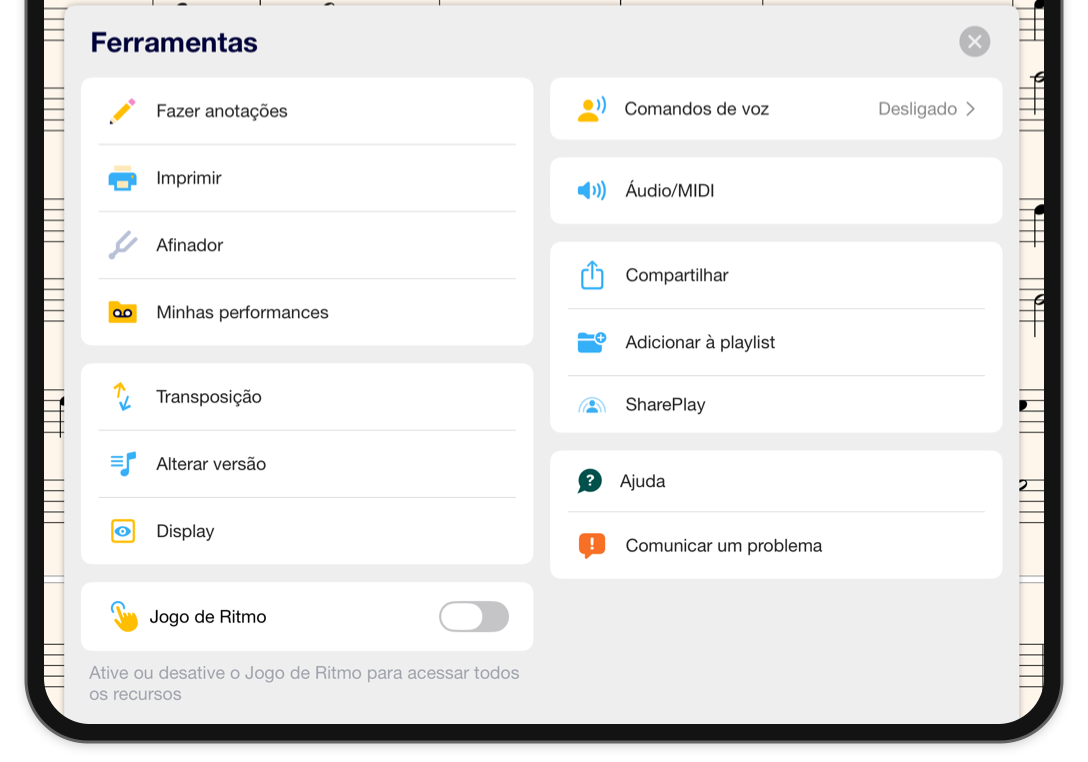 O menu Ferramentas aberto sobre a partitura na horizontal, com anotação, impressão, afinador, gravações, transposição, versões, exibição e configurações de áudio.